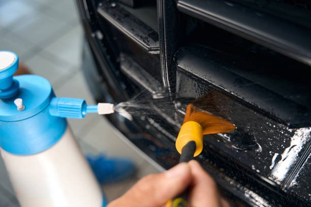   Applying rust converter in order to fix rusted out fenders.
