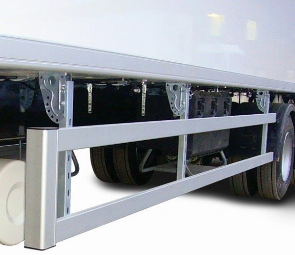 Side guard installed on a semi-trailer, designed to prevent pedestrians and cyclists from slipping underneath the trailer, enhancing road safety